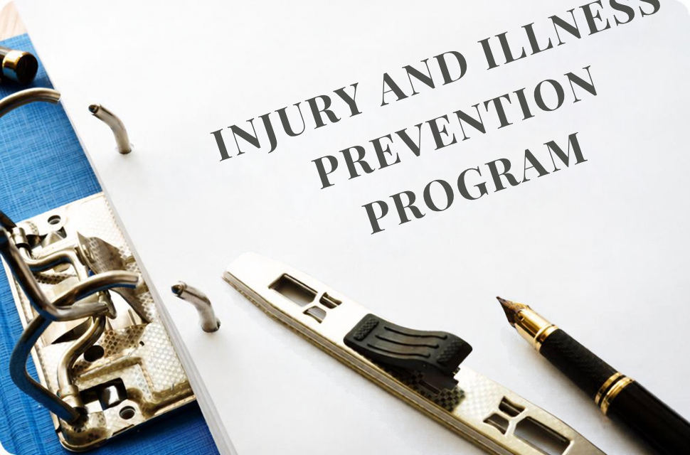 Clipboard page titled 'INJURY AND ILLNESS PREVENTION PROGRAM' with caliper and fountain pen