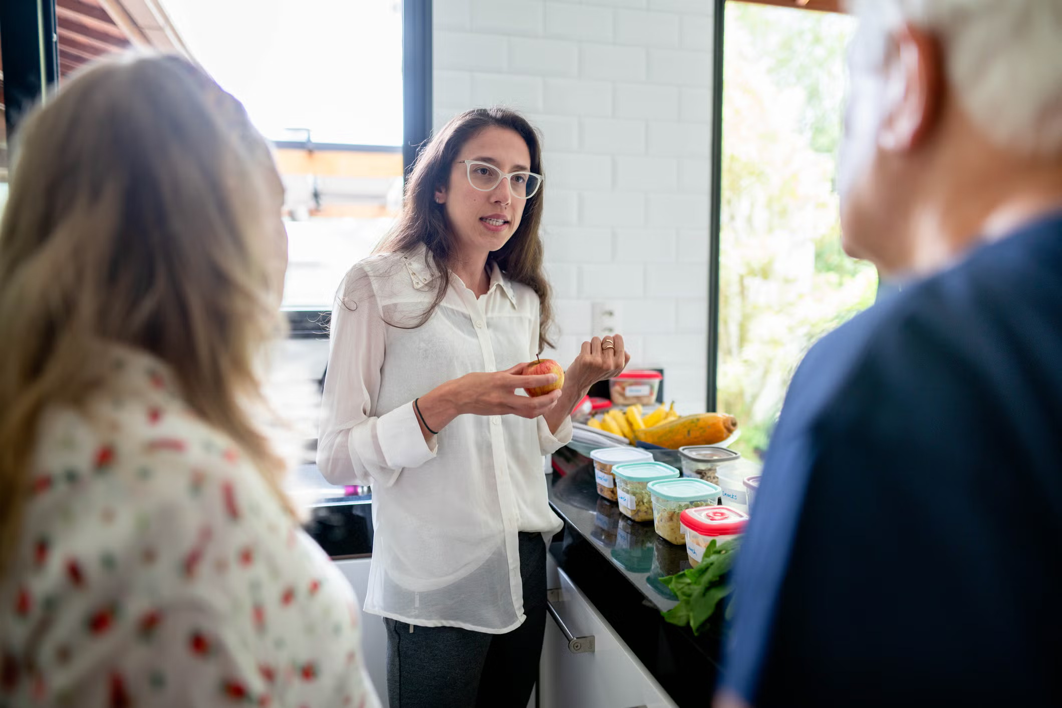 a nutritionist giving advice to patients