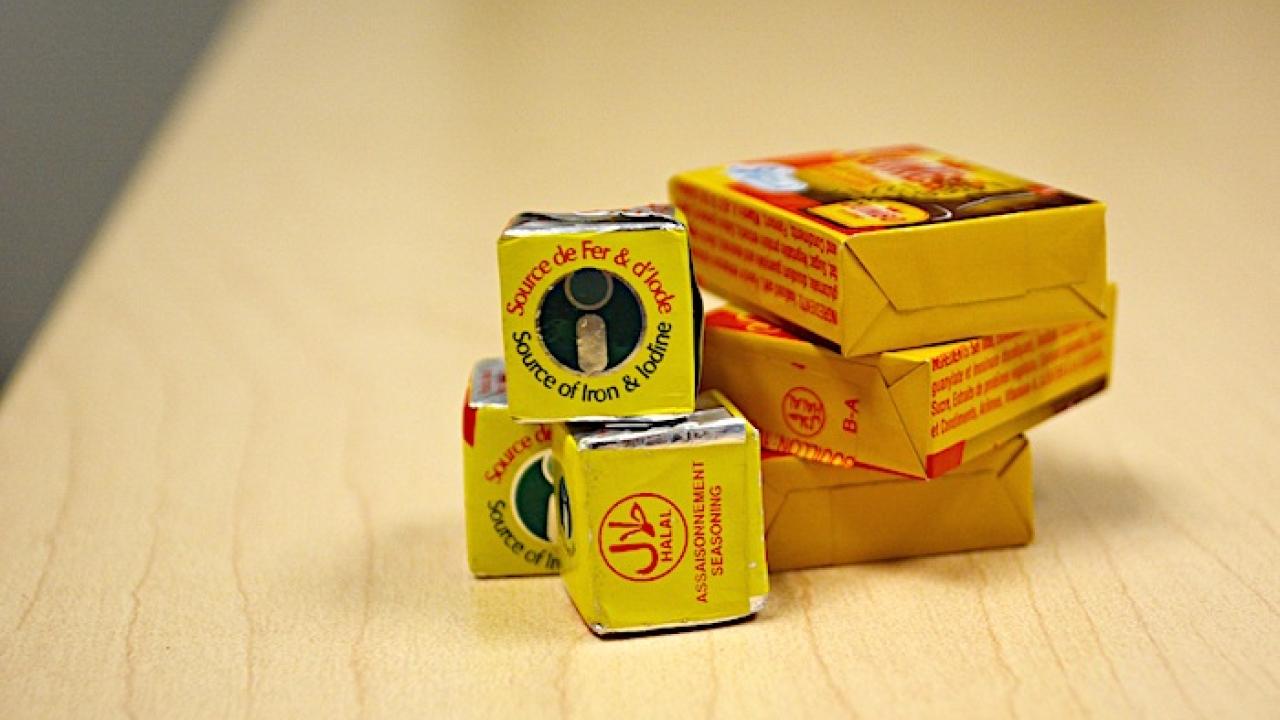 Five bouillon cubes on a desktop