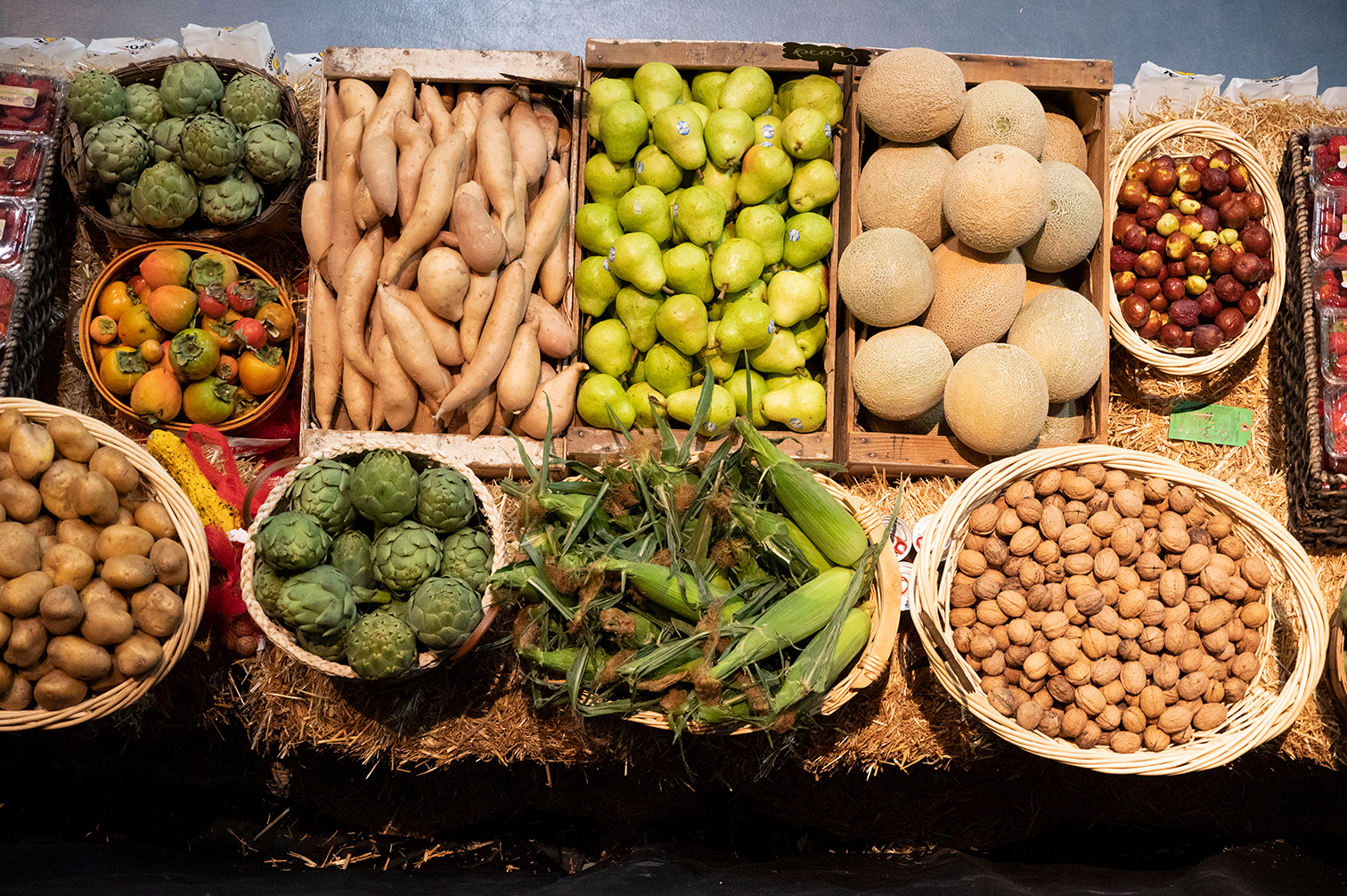 an array of fruits, vegetables and nuts