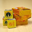 Five bouillon cubes on a desktop